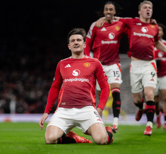 Maguire celebrates excitedly